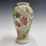 A Moorcroft 'Golden Lily' pattern vase (William Morris Centenary Collection), designed by Rachel