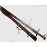 A Sudanese Kaskara sword, with fullered 93.5cm blade, steel cross hilt and white metal grip and