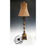 An Elstead Lighting Ltd simulated bamboo 'palm tree' table lamp with shade. Overall height 87cm.