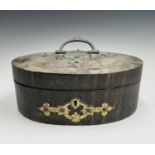 A Victorian coromandel veneered oval workbox, with gothic metal mounts and blue silk interior, width