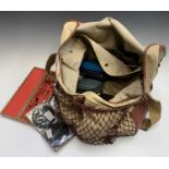 A bag of fly fishing equipment, including two Rimfly Leeda reels, a Wheatley fly box, other flies,