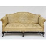 A George II style walnut framed settee, circa 1880, with serpentine shaped top and scroll end