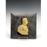 A gilt bronze profile bust of The Duke of Wellington, 19th century, mounted on a square hardwood