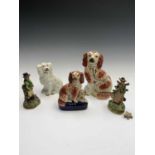 A Staffordshire figure of a seated spaniel and pup, 19th century, on a blue base, height 20cm,