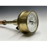 A Bailey's patent brass pyrometer, the enamel dial stamped Albion /works, Salford, length 106cm.