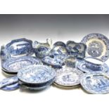 A quantity of 19th blue and white pottery, including two hot water plates, jug, tureens, plates