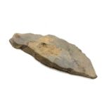 A mesolithic period blade tool. Length 9cm. Provenance: Ex Dr Weller collection.