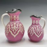 Two 19th century William Brownfield & Sons Cobridge 'Tyrol' pottery jugs, both having a pink