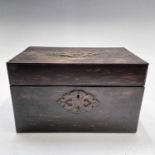 An early Victorian Coromandel wood tea caddy, with cut brass mounts, the interior fitted with two