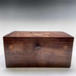 A late George III mahogany rectangular tea caddy, with line inlaid decoration, and floral and swag