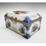 A Dresden porcelain jewellery box or casket, 19th century, painted to the cover and sides with