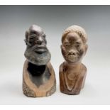 An African carved wood head and shoulders bust of a bearded man, height 24.5cm, together with