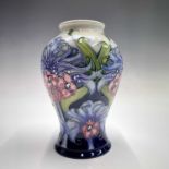 A Moorcroft 'Florian Lilac' pattern vase, designed by Emma Bossons, painted and impressed marks to
