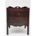A George III mahogany tray top night commode, with a slide above two doors, with pull-out lower