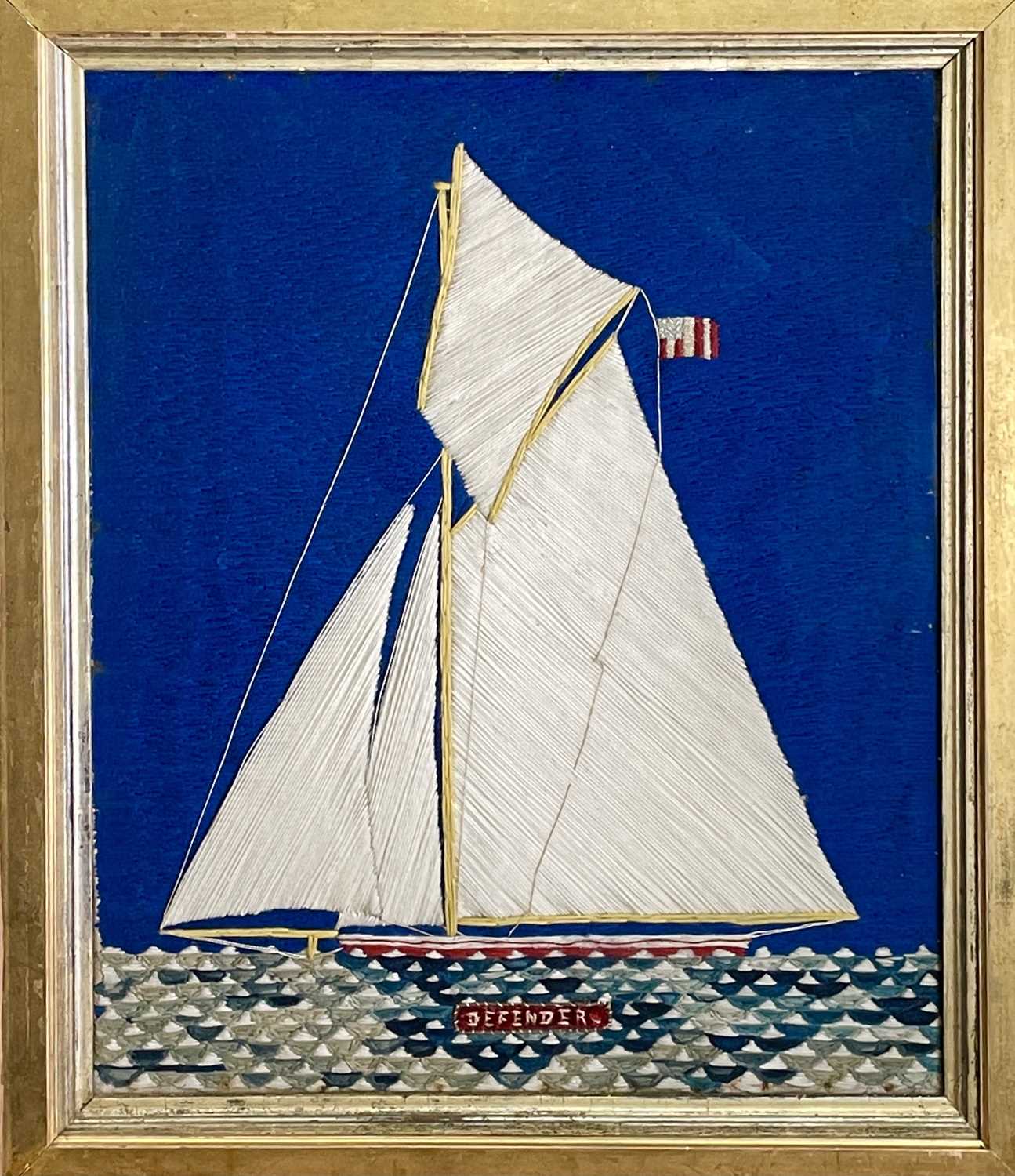 A late 19th/early 20th century woolwork ship portrait of the yacht 'Defender' (America's Cup - Image 2 of 3