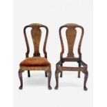 A pair of George I walnut dining chairs, with vase-shaped splats, and raised on cabriole front