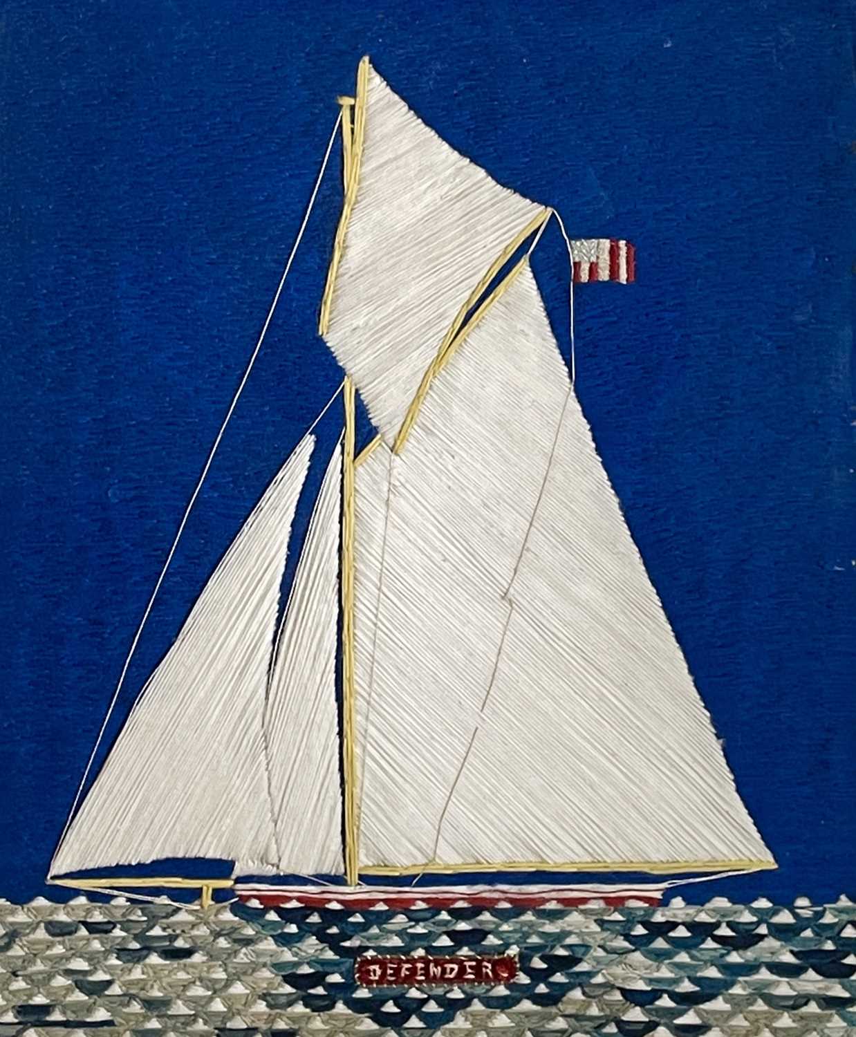 A late 19th/early 20th century woolwork ship portrait of the yacht 'Defender' (America's Cup