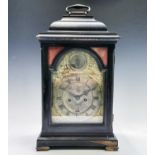 A mid 18th century ebonised bracket clock, the arched dial signed Thos Colley, with twin fusee