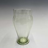 A Whitefriars ribbed glass vase designed by Harry Powell c.1919, in the 'sea green' shade. Height