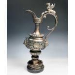 A bronzed ewer in the classical style. Height 53cm.