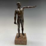 Wladyslaw Miecznik. A Polish bronze model of an athlete, sculptors name plate to the reverse, full