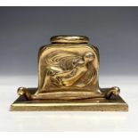 A gilt bronze inkwell, in the Art Nouveau taste, the front cast with a maiden in diaphanous robes on