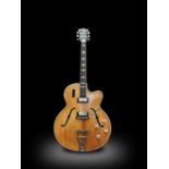 A Hofner Committee guitar, with a spruce top and birds eye maple back and sides, with decorative