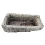 A large granite rectangular trough. Maximum height 39cm, width 107, depth 48cm.