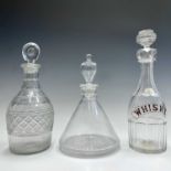 An early Victorian cut glass decanter, engraved and gilded 'Whisky', with a stopper, height 32.