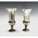 A pair of silver thistle shape filled vases by William Comyns & Sons London 1904 15cm