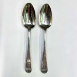 A pair of Irish 18th century bright-cut silver crested tablespoons. One is by John Pittar Dublin