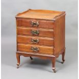 An Edwardian Art Nouveau walnut sheet music chest with 3/4 gallery, fitted 4 long drawers, raised on