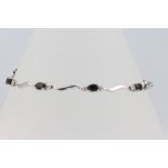 A 9ct white gold sapphire and diamond bracelet, 20cm, 4.3 grams