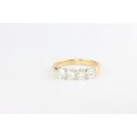 An 18ct yellow gold 4 stone diamond ring, approx. 1.08ct, size M, 4.3 grams