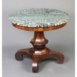 A William IV rosewood centre table with green marble top, raised on carved column and triform base
