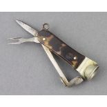 A 19th Century steel cigar cutter, the mother of pearl effect grip with miniature knife and fork 5cm