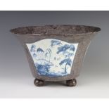 A contemporary English ceramic planter decorated with landscape views with pavillion, on ball feet