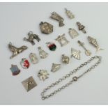A collection of silver charms 24 grams