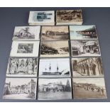 A quantity of black and white postcards