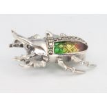 A silver beetle brooch/pendant with marcasites and enamel 32mm