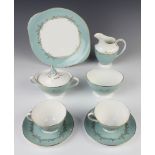 A Royal Doulton Melrose pattern tea service comprising 12 tea cups, 12 saucers, milk jug, lidded