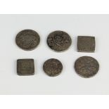 A 19th Century Indian silver coin and 5 others