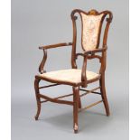An Edwardian inlaid bleached mahogany open armchair with upholstered seat and backSun bleached