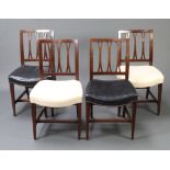 A set of 4 Georgian mahogany stick and rail back dining chairs with overstuffed seats, 2 upholstered