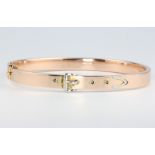 A 15ct yellow gold buckle bangle 9.9 grams