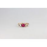 A 9ct yellow gold 3 stone gem set ring, 1.8 grams, size L
