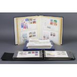 Three albums of Elizabeth II GB first day covers together with loose first day covers