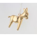 A 9ct yellow gold charm in the form of a donkey, 1.4 grams
