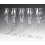 A set of 5 Renwick and Clarke champagne flutes 37cm