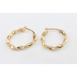 A pair of 9ct yellow gold twist earrings 1.2 grams